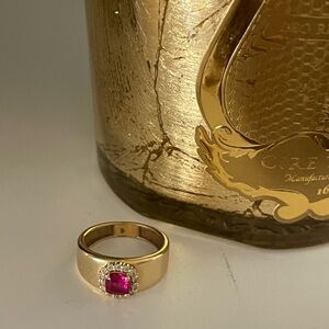 Elegant Gold Ring with Ruby and Diamond Accents